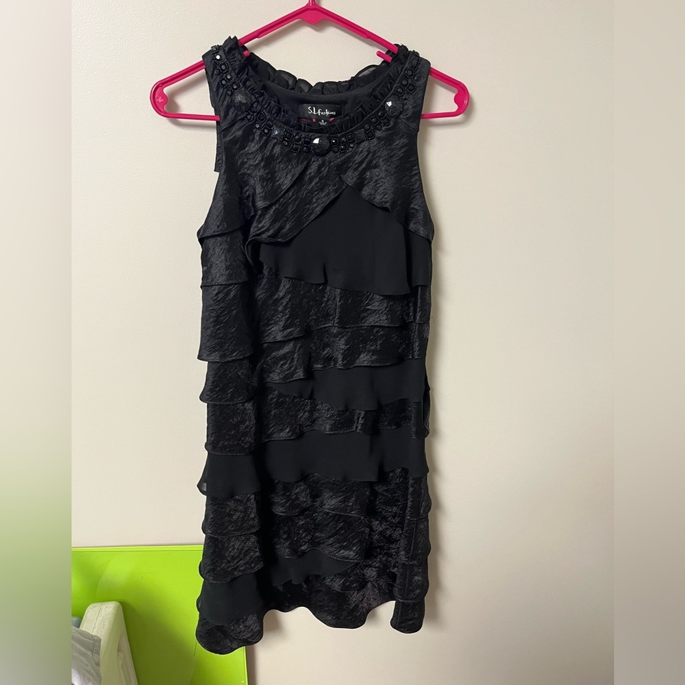 SL Fashion’s Black Ruffled Sleeveless Tiered Party/Cocktail Dress.